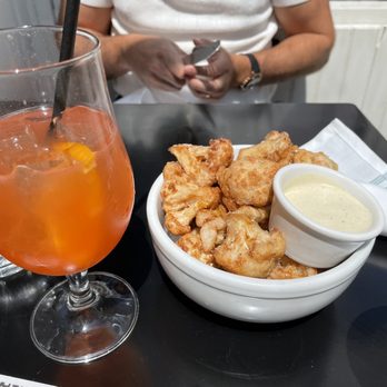 The Wren - Spiked spa water & Fried pickled cauliflower - Bars Near Me - New York, New York The Wren - Spiked spa water & Fried pickled cauliflower - Bars Near Me - New York, New York