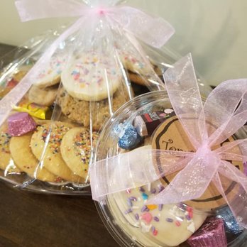 Terri Ann's - a tray of cookies and a container of cookies - Desserts Near Me Terri Ann's - a tray of cookies and a container of cookies - Desserts Near Me