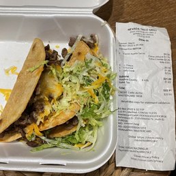 Extra cheese and lettuce we didn't ask for or even get. $15 for two tacos! The drink tasted spoiled too and was immediately dumped.