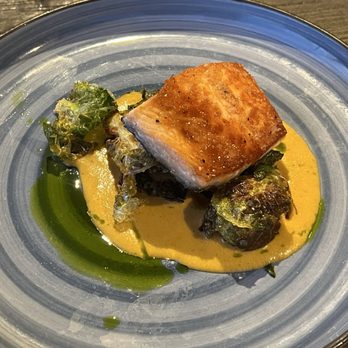 Water's Edge Restaurant and Bar - Grilled Atlantic Salmon and Crispy Brussel Sprouts - New American Near Me - Ventura, California Water's Edge Restaurant and Bar - Grilled Atlantic Salmon and Crispy Brussel Sprouts - New American Near Me - Ventura, California
