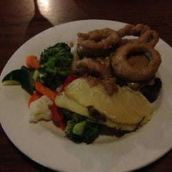 Molly Malones Irish Pub - Steak with Guinness battered onion rings and veges