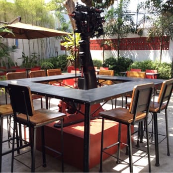 Industriya - The outdoor bar enclosed another shoe factory artifact. - Local Flavor Near Me - Marikina, NCR