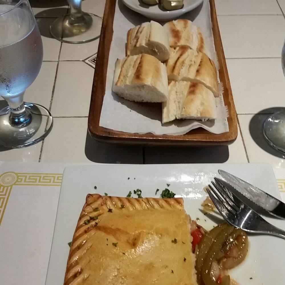 La Taberna De Ignacio - Hialeah - Empanada Gallega (Galician Chicken Pie) with pickled roasted peppers and onion - Spanish Near Me - Hialeah, Florida La Taberna De Ignacio - Hialeah - Empanada Gallega (Galician Chicken Pie) with pickled roasted peppers and onion - Spanish Near Me - Hialeah, Florida