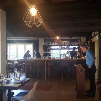 Il Nido - View towards entrance, bar, and host stand (10/9/19) - Italian Near Me - Seattle, Washington Il Nido - View towards entrance, bar, and host stand (10/9/19) - Italian Near Me - Seattle, Washington