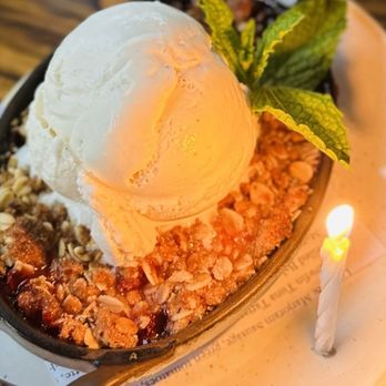 FlintCreek Cattle - Warm strawberry - rhubarb crisp - New American Near Me - Seattle, Washington