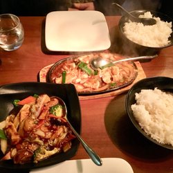 McChina Eating Restaurant & Takeaway - Monks' vegetables (foreground) and sizzling chicken with ginger and spring onions, and boiled rice.