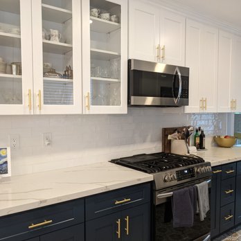Trucor Construction - a kitchen with white and blue cabinets - General Contractors Near Me - Huntington Beach, California Trucor Construction - a kitchen with white and blue cabinets - General Contractors Near Me - Huntington Beach, California