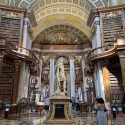 Prunksaal der Österreichischen Nationalbibliothek - Statue of Emperor Charles VI stands in the middle of the hall