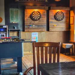 View of dartboards & foosball table area