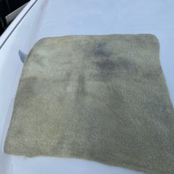Hertz Rent A Car - Other side of what was a bright yellow rag. Disgusting!!!!! I have to put my kids in this nasty car!!!!