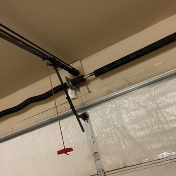 Olympus Garage Door Repair - Broken spring - Garage Door Services Near Me - Tempe, Arizona