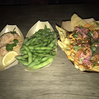 Rooftop 93 - (Left to right ) lobster tacos , edamame, and pulled pork tacos - Lounges Near Me - New York, New York Rooftop 93 - (Left to right ) lobster tacos , edamame, and pulled pork tacos - Lounges Near Me - New York, New York