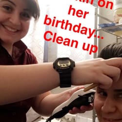 Gentlemen’s Cuts Barber Shop - Liz getting down on her house calls
