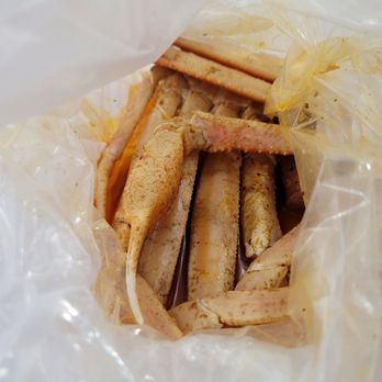 Crazy Crab - a close up of a plastic bag - Cajun/Creole Near Me - Streamwood, Illinois