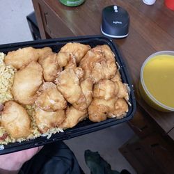 Happy China - "Chicken w/ almond" is fried chicken bites with an almond gravy. There were no unprocessed almonds or almond slices.