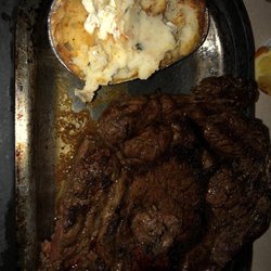 The Heiting Place - Medium rare to medium ribeye with twice baked potato