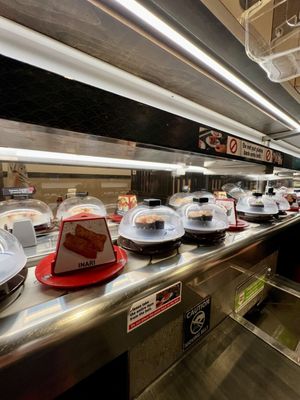 Kura Revolving Sushi Bar by null