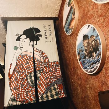 Oshima - a woman in a kimono kimono - Sushi Bars Near Me - Sioux Falls, South Dakota