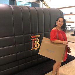 Lovely wife with the Burberry bag display. It was recently transferred from San Francisco at the time that we were there.