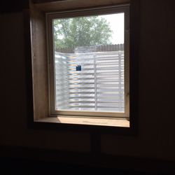 Outdoor Solutions Landscaping - Indoor view of our brand new egress window