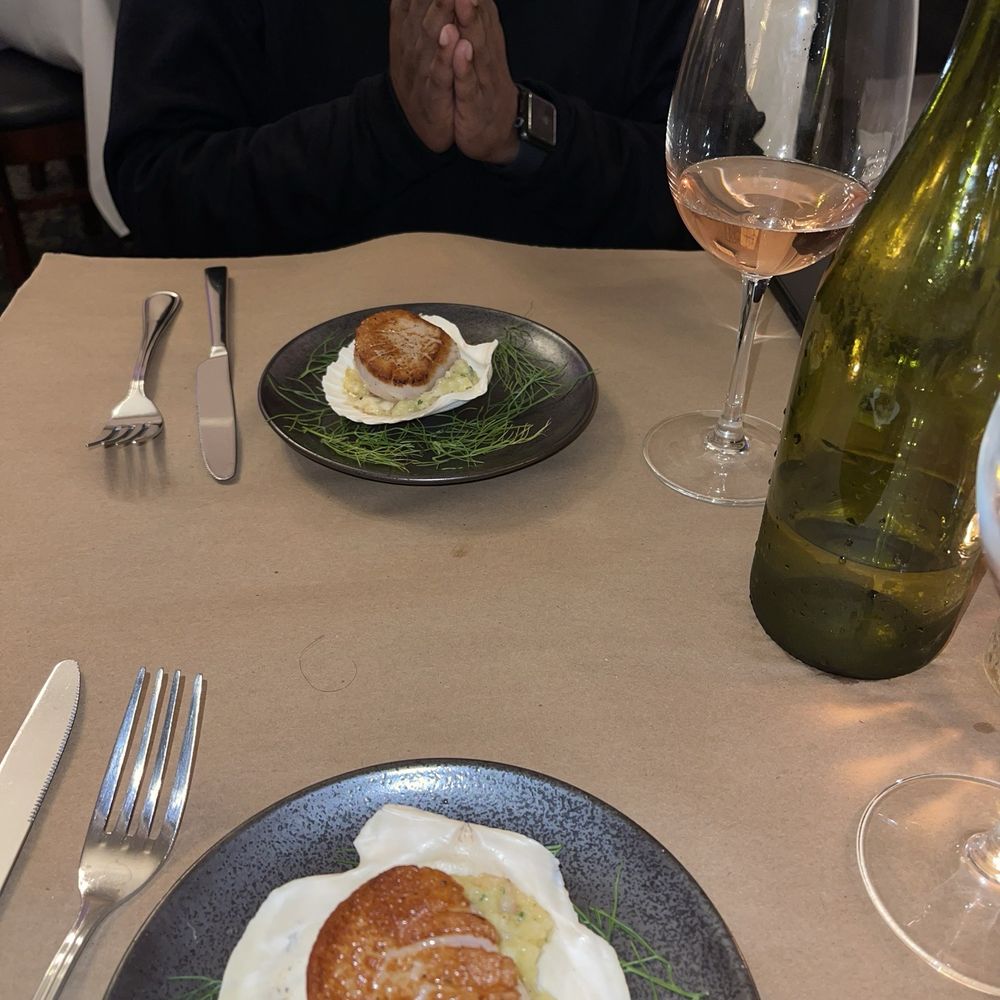 Seared diver scallop with risotto aux fruits de mer Seared diver scallop with risotto aux fruits de mer