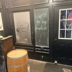 O'Slattery's Irish Restaurant & Pub - Back door and humorous chalkboard.