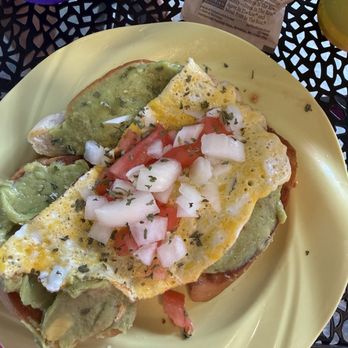 Kristy’s On The Caribe - Avocado toast with egg - Breakfast & Brunch Near Me - Vieques, Puerto Rico Kristy’s On The Caribe - Avocado toast with egg - Breakfast & Brunch Near Me - Vieques, Puerto Rico