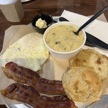 Southern Fowl - 2 eggs over medium, crisp bacon, biscuits, and grits. - Breakfast & Brunch Near Me - Longwood, Florida Southern Fowl - 2 eggs over medium, crisp bacon, biscuits, and grits. - Breakfast & Brunch Near Me - Longwood, Florida