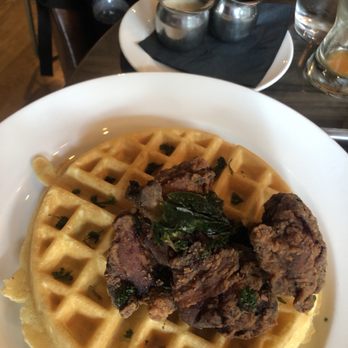 Stella San Jac - Chicken and waffles. Looks over fried but juicy. Maple syrup has extra bourbon. Good but had better. - New American Near Me - Austin, Texas Stella San Jac - Chicken and waffles. Looks over fried but juicy. Maple syrup has extra bourbon. Good but had better. - New American Near Me - Austin, Texas