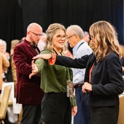 Omega Senior Living - Team members engaged in an activity presented by the keynote speaker at the 2024 Leadership Conference--learning together!