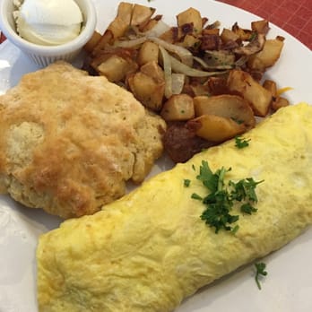 Sweet Maple Cafe - Omelette with cheddar, onions, and Italian sausage; potatoes with onions; fresh, wonderful biscuit. Great meal! - American Near Me - Chicago, Illinois