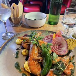 Le Tremail - Large shrimp with black rice and sauces in a  lovely presentation