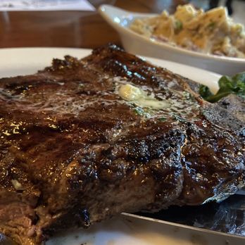 Texas Cattle Company - Cowgirl steak (cooked medium) with mashed potatoes - Steakhouses Near Me - Lakeland, Florida Texas Cattle Company - Cowgirl steak (cooked medium) with mashed potatoes - Steakhouses Near Me - Lakeland, Florida