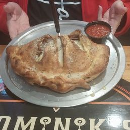 My daughter's Calzone. It was stuffed with meats and cheese! My daughter's Calzone. It was stuffed with meats and cheese!