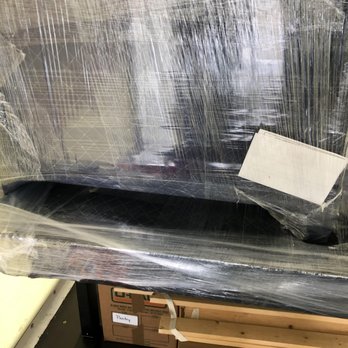 Fantastic Moves - Heavy furniture loaded feet down on top of a desk puncturing the desk. - Movers Near Me - Dallas, Texas Fantastic Moves - Heavy furniture loaded feet down on top of a desk puncturing the desk. - Movers Near Me - Dallas, Texas