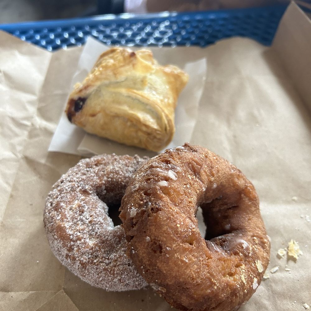 Boa Vista Orchards - Pastry selection. Blueberry dumpling in the rear. Sugared and glazed donut in the front - Fruits & Veggies Near Me - Placerville, California