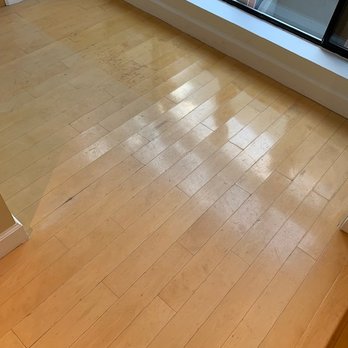 Q's Flooring - Before Refinishing (shadow left by the sun) - Flooring Near Me