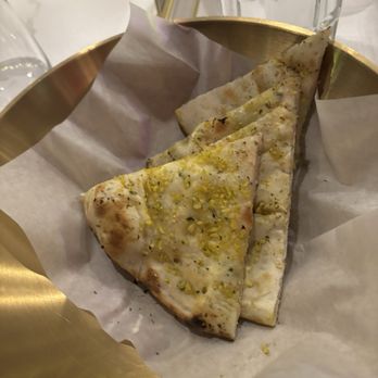 Karma Social Lounge - Garlic naan. - Indian Near Me - Milton, Ontario Karma Social Lounge - Garlic naan. - Indian Near Me - Milton, Ontario