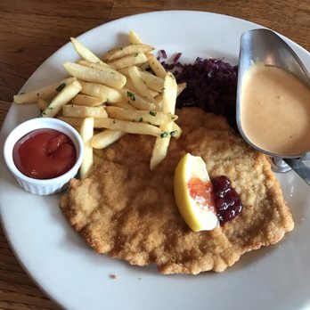 Jorg's Cafe Vienna - Original pork schnitzel with red cabbage and fries. - German Near Me - Plano, Texas