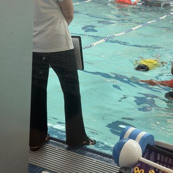 AquaTech Swim School - Alameda - Soaking her shoes into the pool - Swimming Lessons/Schools Near Me - Alameda, California AquaTech Swim School - Alameda - Soaking her shoes into the pool - Swimming Lessons/Schools Near Me - Alameda, California