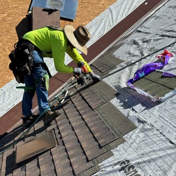 Rooftops USA - Professional roof installation in progress, with new underlayment and shingles carefully applied for lasting protection. - Roofing Near Me - Bakersfield, California Rooftops USA - Professional roof installation in progress, with new underlayment and shingles carefully applied for lasting protection. - Roofing Near Me - Bakersfield, California