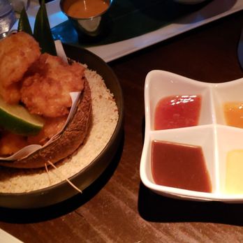Three Dots and A Dash - Coconut shrimp ($14) and condiment caddy! Clockwise it had: sweet n sour, hot mustard, peanut sauce, sweet thai chili - Asian Fusion Near Me - Chicago, Illinois Three Dots and A Dash - Coconut shrimp ($14) and condiment caddy! Clockwise it had: sweet n sour, hot mustard, peanut sauce, sweet thai chili - Asian Fusion Near Me - Chicago, Illinois