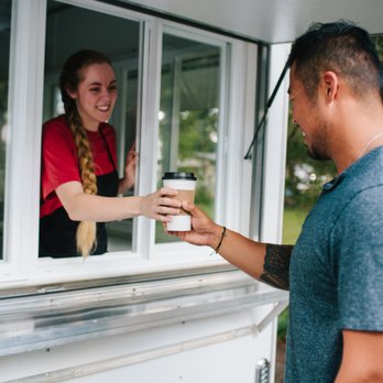 Maresca's Coffee Counter - a man handing a cup of coffee to a woman - Coffee & Tea Near Me - Charlottesville, Virginia Maresca's Coffee Counter - a man handing a cup of coffee to a woman - Coffee & Tea Near Me - Charlottesville, Virginia