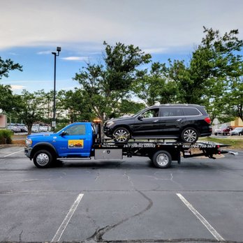 Snoork Towing - Mercedes being towed by Snoork Towing in Monroe. - Towing Near Me - Monroe, North Carolina Snoork Towing - Mercedes being towed by Snoork Towing in Monroe. - Towing Near Me - Monroe, North Carolina