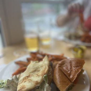 On the Docks - Crispy chicken naan Wrap (SOOOOOOO SCRUMPTIOUS)! and hot chicken sandwich - Pubs Near Me - Huntsville, Ontario On the Docks - Crispy chicken naan Wrap (SOOOOOOO SCRUMPTIOUS)! and hot chicken sandwich - Pubs Near Me - Huntsville, Ontario