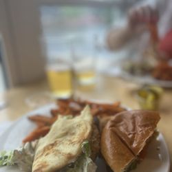 On the Docks - Crispy chicken naan Wrap (SOOOOOOO SCRUMPTIOUS)! and hot chicken sandwich