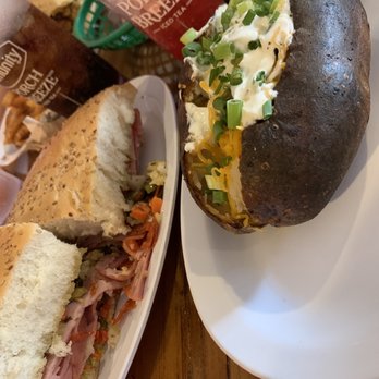 Boutte's Bayou Restaurant - Dressed baked potato, red cream soda, and 1/2 muffuletta! Yummy! - Cajun/Creole Near Me - Lafitte, Louisiana