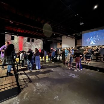 Bayboro Brewing - a group of people standing in front of a projector screen - Breweries Near Me - St. Petersburg, Florida Bayboro Brewing - a group of people standing in front of a projector screen - Breweries Near Me - St. Petersburg, Florida