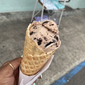 Lolly’s Creamery - Nutella Oreo Ice Cream in a Waffle Cone - Ice Cream & Frozen Yogurt Near Me - Virginia Beach, Virginia Lolly’s Creamery - Nutella Oreo Ice Cream in a Waffle Cone - Ice Cream & Frozen Yogurt Near Me - Virginia Beach, Virginia