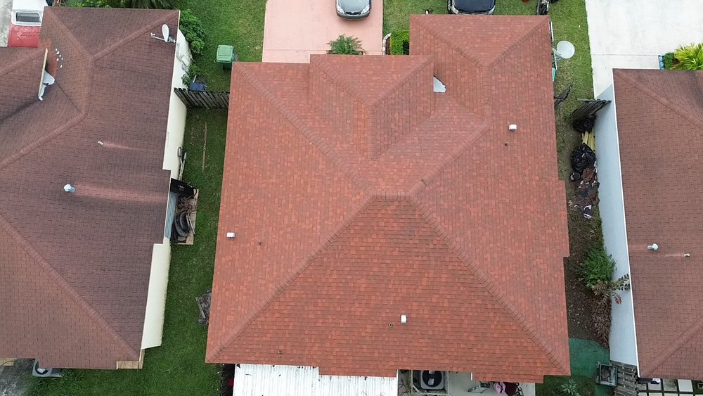 Slide of MC Roofing Service